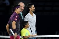 Stan Smith with Kei Nishikori (L) and Novak Djokovic at the 2018 US Open